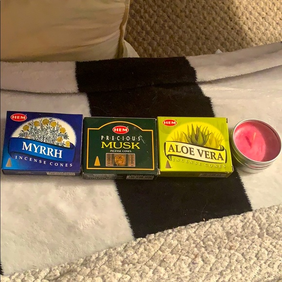 Three incense cones and pink candle!